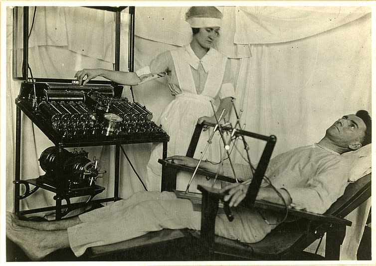 <span class="caption">A World War I soldier being treated with an early analogue of ECT. ECT as we know it was developed in 1934.</span> <span class="attribution"><a class="link " href="https://commons.wikimedia.org/wiki/File:Bergonic_chair.jpg" rel="nofollow noopener" target="_blank" data-ylk="slk:Reeve041476;elm:context_link;itc:0;sec:content-canvas">Reeve041476</a>, <a class="link " href="http://creativecommons.org/licenses/by/4.0/" rel="nofollow noopener" target="_blank" data-ylk="slk:CC BY;elm:context_link;itc:0;sec:content-canvas">CC BY</a></span>