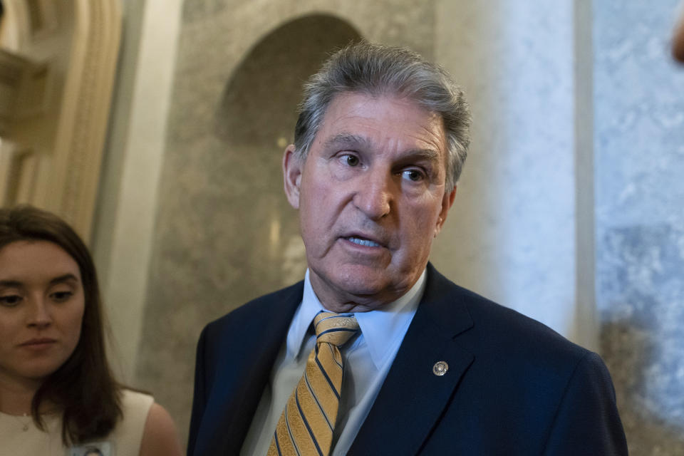 Sen. Joe Manchin, D-W.Va., talks with reporters as the Senate voted on a key test vote on the For the People Act, a sweeping bill that would overhaul the election system and voting rights, at the Capitol in Washington, Tuesday, June 22, 2021. The bill is a top priority for Democrats seeking to ensure access to the polls and mail in ballots, but it is opposed by Republicans as a federal overreach. (AP Photo/Alex Brandon)