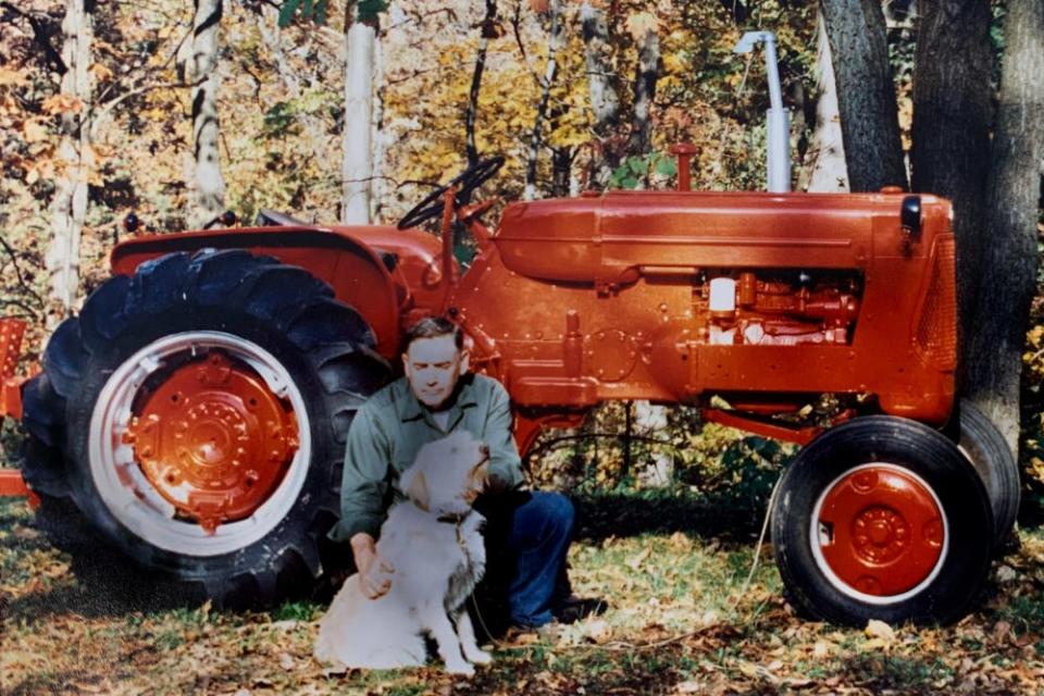 Irving Shaw Jr. is pictured with his favorite dog, Freddy. Shaw, who worked in the Lenawee County Prosecutor's Office for almost 60 years, including almost 18 years as prosecutor, died Dec. 23 at the age of 91.