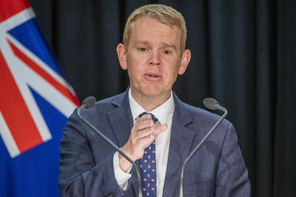 New Zealand Prime Minister Chris Hipkins gestures during his post-Cabinet press conference at Parliament in Wellington, New Zealand, Wednesday, Feb. 8, 2023. Hipkins said he was axing or delaying a number of his government's more contentious policy plans as he looked to refocus on priorities like the cost of living. (Mark Mitchell/NZ Herald via AP)