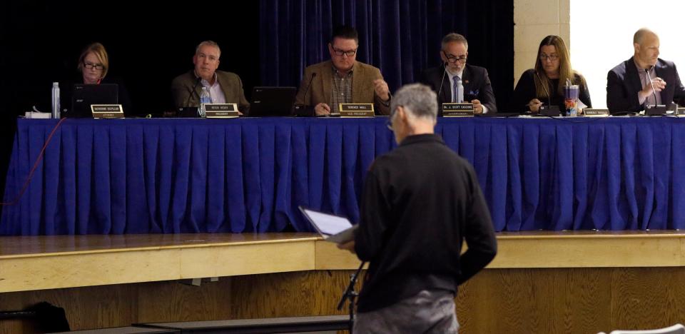 Holmdel Board of Education members listen to public comment during their meeting Wednesday night, September 27, 2023. They were considering whether to repeal its current student transgender policy, a move that would remove explicit protections for transgender students from the district's policy manual.