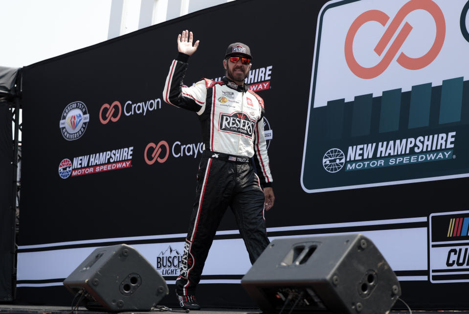 LOUDON, NH - JULY 17: Martin Truex, Jr (#19 Joe Gibbs Racing Reser&#39;s Fine Foods Toyota) is introduced to the fans before the Crayon 301 on July 17, 2023, at New Hampshire Motor Speedway in Loudon, New Hampshire. (Photo by Fred Kfoury III/Icon Sportswire via Getty Images)