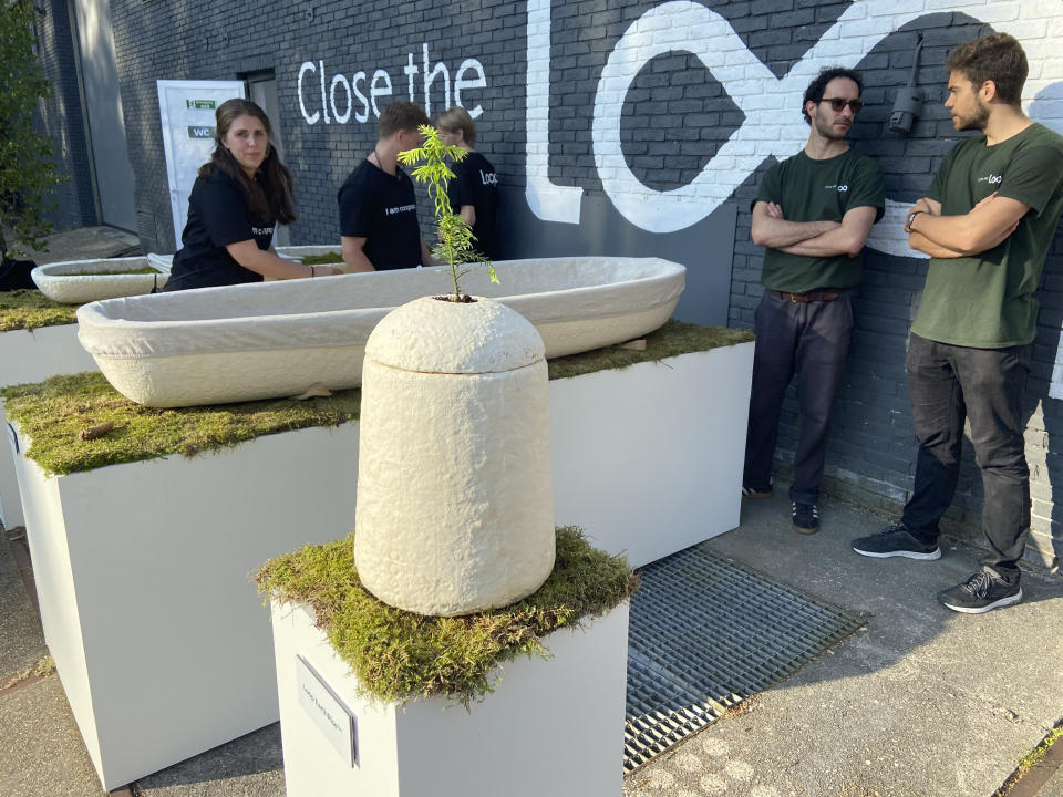 Dutch startup Loop Biotech displays cocoon-like coffins and urns, grown from local mushrooms and up-cycled hemp fibres, designed to dissolve into the environment amid growing demand for more sustainable burial practices, in Delft, Netherlands, Monday, May 22, 2023. A Dutch intrepid inventor is now “growing” coffins by putting mycelium, the root structure of mushrooms, together with hemp fiber in a special mold that, in a week, turns into what could basically be compared to the looks of an unpainted Egyptian sarcophagus. (AP Photo/Aleksandar Furtula)