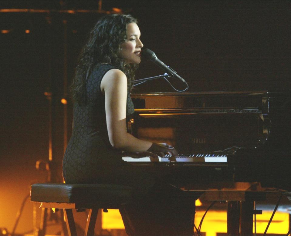 <div class="inline-image__caption"><p>Norah Jones performs during the 45th Annual Grammy Awards at Madison Square Garden on February 23, 2003 in New York City.</p></div> <div class="inline-image__credit">Frank Micelotta/Getty</div>