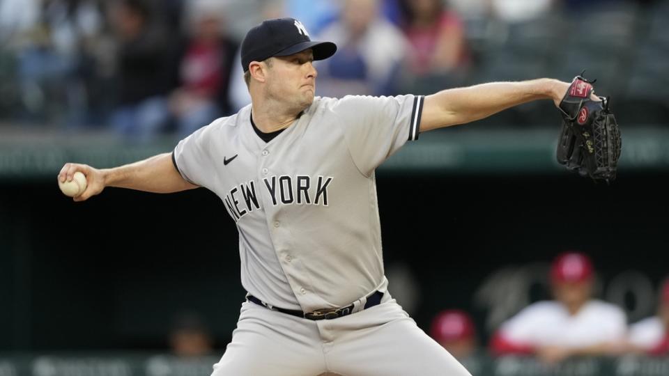 Apr 27, 2023;  Arlington, Texas, USA;  New York Yankees starting pitcher Gerrit Cole (45) delivers a pitch to the Texas Rangers during the first inning at Globe Life Field.