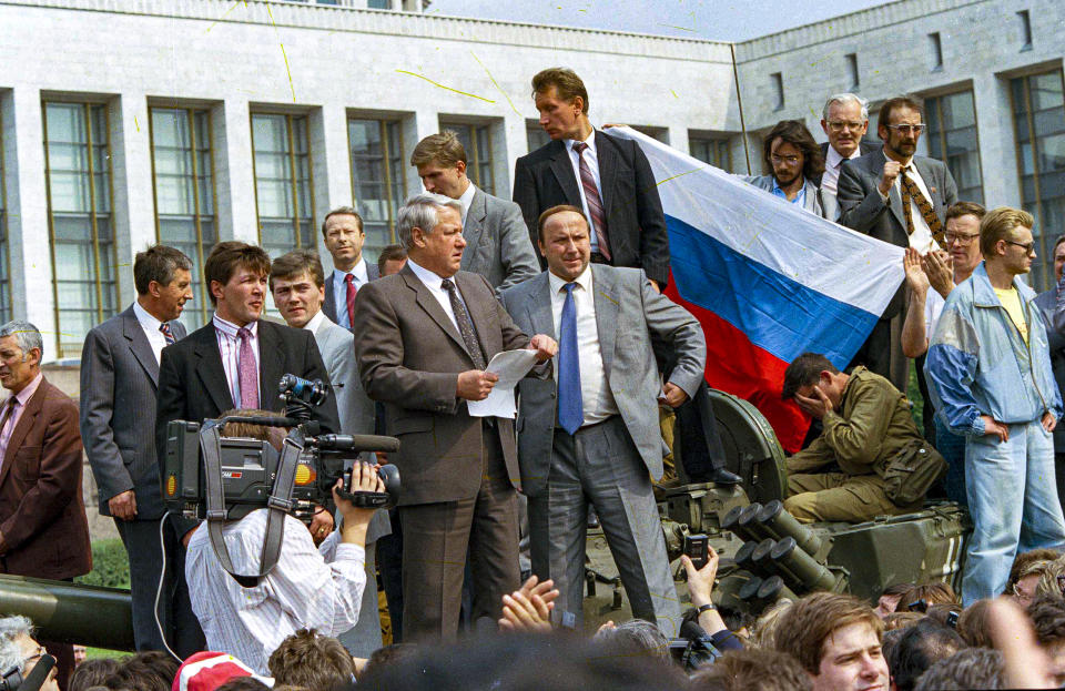 FILE - In this Monday, Aug. 19, 1991 file photo, Boris Yeltsin, president of the Russian Federation, makes a speech from atop a tank in front of the Russian parliament building in Moscow, Russia. When a group of top Communist officials ousted Soviet leader Mikhail Gorbachev 30 years ago and flooded Moscow with tanks, the world held its breath, fearing a rollback on liberal reforms and a return to the Cold War confrontation. But the August 1991 coup collapsed in just three days, precipitating the breakup of the Soviet Union that plotters said they were trying to prevent. (AP Photo, File)