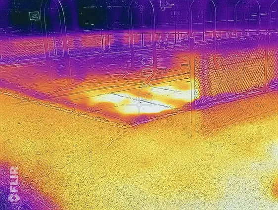 The thermal image Brianna Rodriguez, 18, took of her elementary school's playground swing set in the Nodine Hill neighborhood of Yonkers, New York. Rodriguez was capturing images in urban heat islands for her work with the environmental justice nonprofit Groundwork Hudson Valley. The brighter spots indicate greater heat intensity.