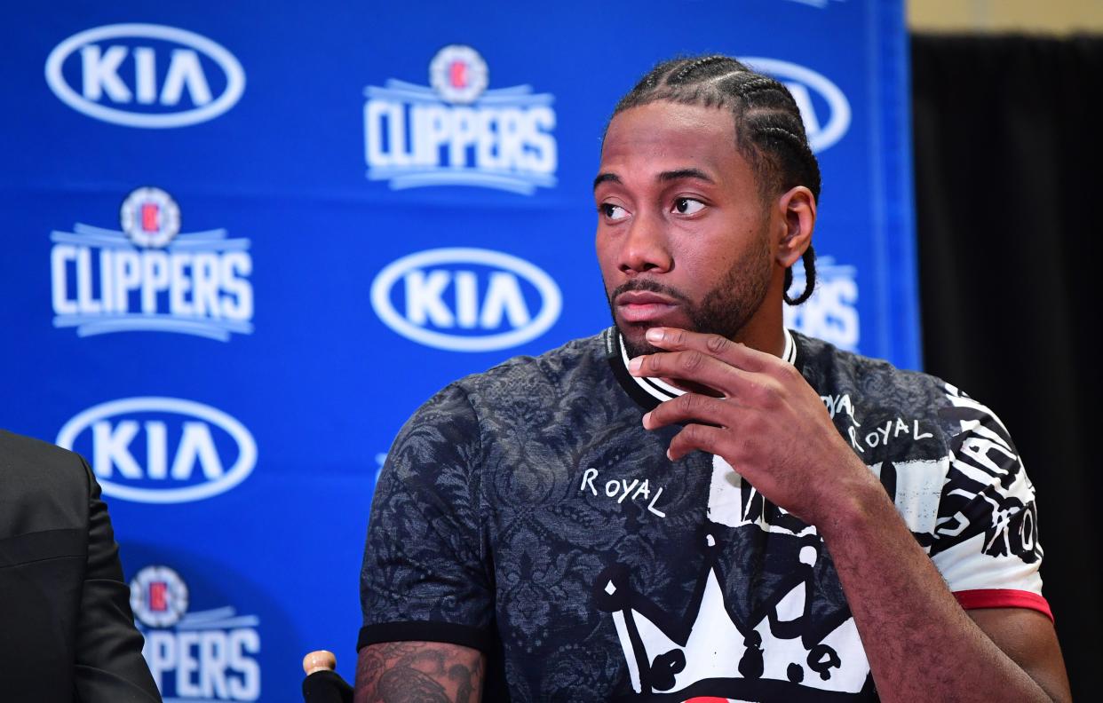 US basketball player Kawhi Leonard speaks during a press conference introducing Leonard and Paul George as new players on the Los Angeles Clippers in Los Angeles on July 24, 2019. (Photo by Frederic J. BROWN / AFP)        (Photo credit should read FREDERIC J. BROWN/AFP/Getty Images)