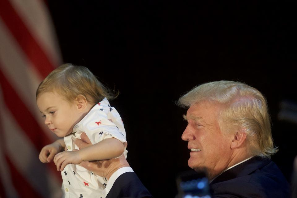 Republican presidential hopeful Donald Trump holds Tristan Murphy, 1, following a campaign event with Trump's daughter, Ivanka, at the Aston Township Community Center on Sept. 13, 2016, in Aston, Pa. (Photo: Mark Makela/Getty Images)