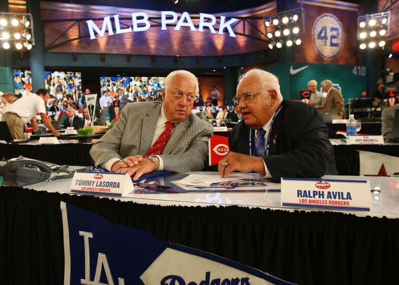 SECAUCUS, NJ - JUNE 07: Team representative Tommy Lasorda and Ralph Avila.