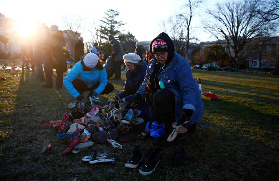 <p>Activists install 7000 shoes on the lawn in front of the U.S. Capitol on Capitol Hill in Washington, March 13, 2018. (Photo: Eric Thayer/Reuters) </p>