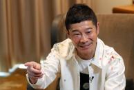 Japanese billionaire Yusaku Maezawa speaks during an interview with Reuters in Tokyo