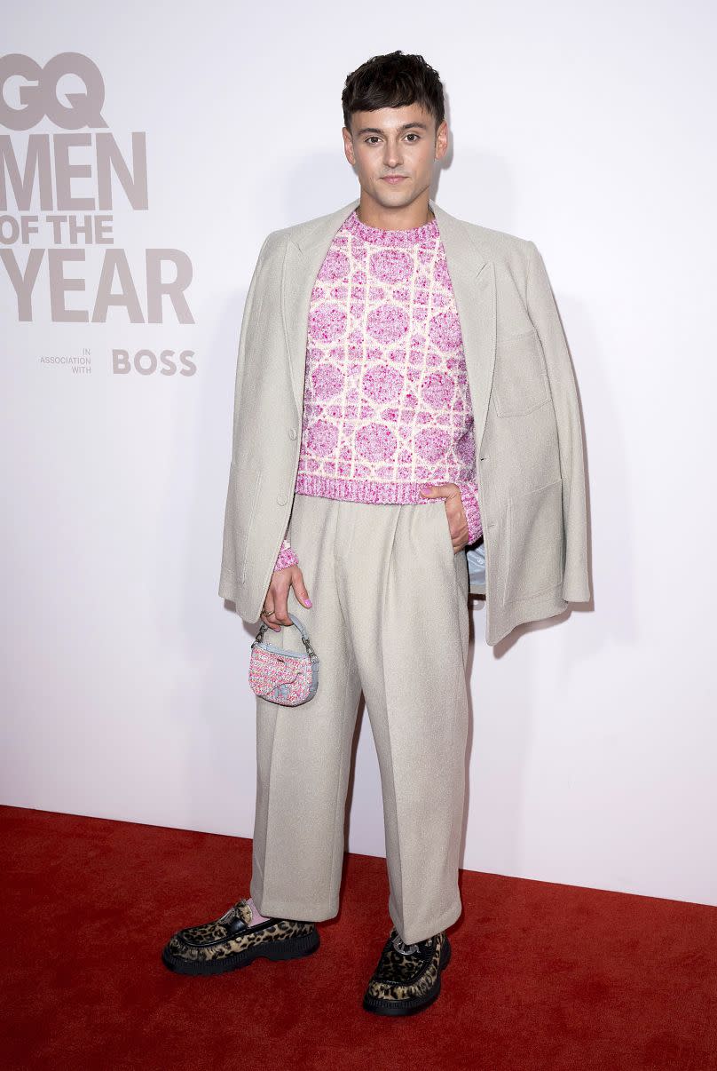 Tom Daley poses for photographers upon arrival at the GQ Men of the Year Awards in London, Wednesday, Nov. 15, 2023.