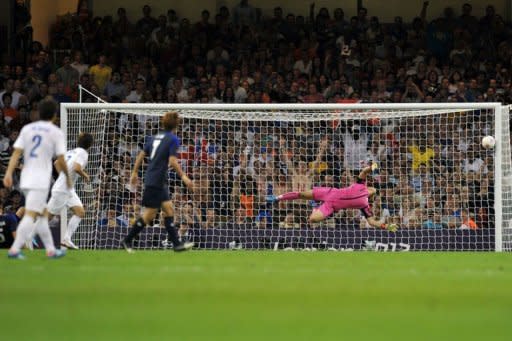 South Korea's midfielder Koo Jacheol (not pictured) scores against Japan during the bronze medal football match of the London Olympic Games. Japan won 2-0