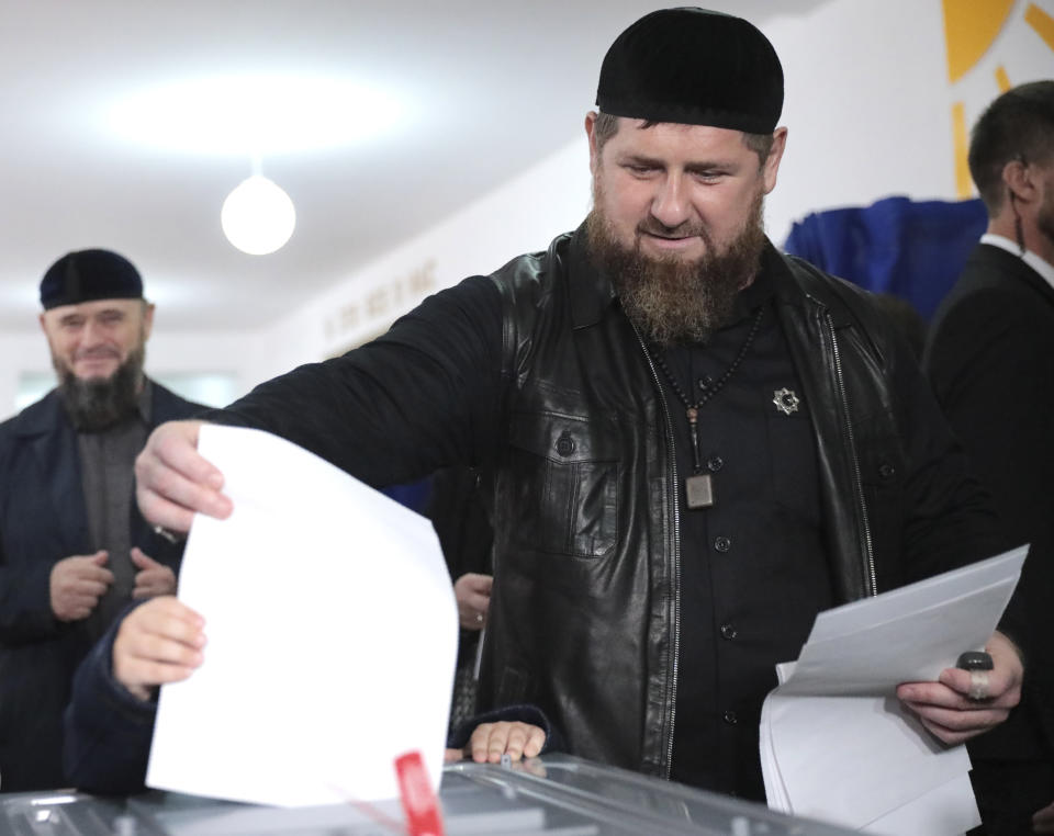 Chechnya's regional leader Ramzan Kadyrov casts his ballot at a polling station during the Parliamentary elections in Akhmat-Yurt, Russia, Saturday, Sept. 18, 2021. Sunday will be the last of three days voting for a new parliament, but there seems to be no expectation that United Russia, the party devoted to President Vladimir Putin, will lose its dominance in the State Duma. (AP Photo/Musa Sadulayev)