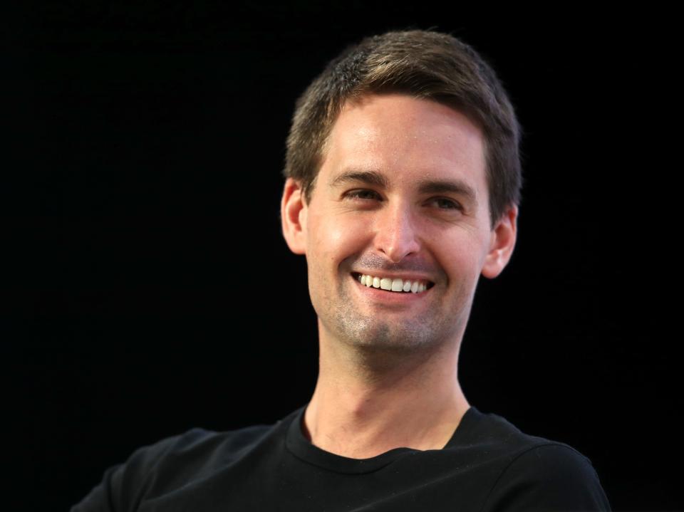 Evan Spiegel smiling during an interview at the TechCrunch Disrupt SF 2019 conference.