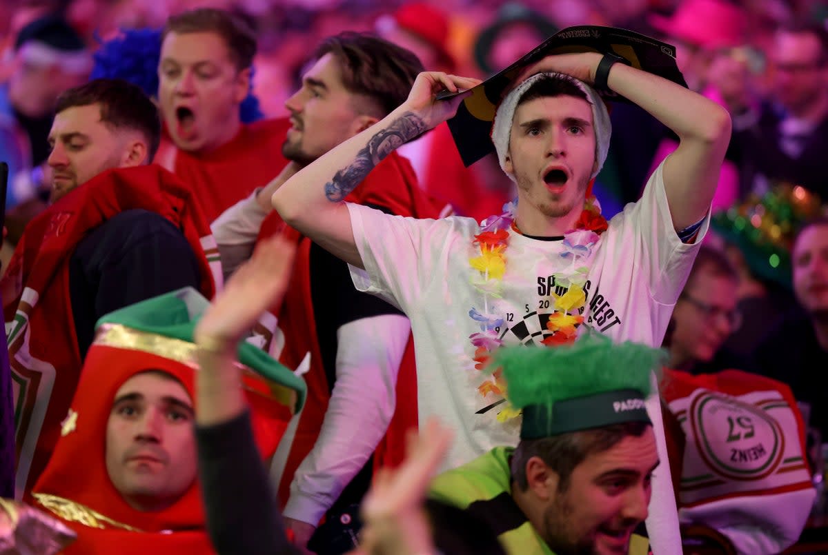 Fans at the opening night of the World Darts Championship  (Getty)