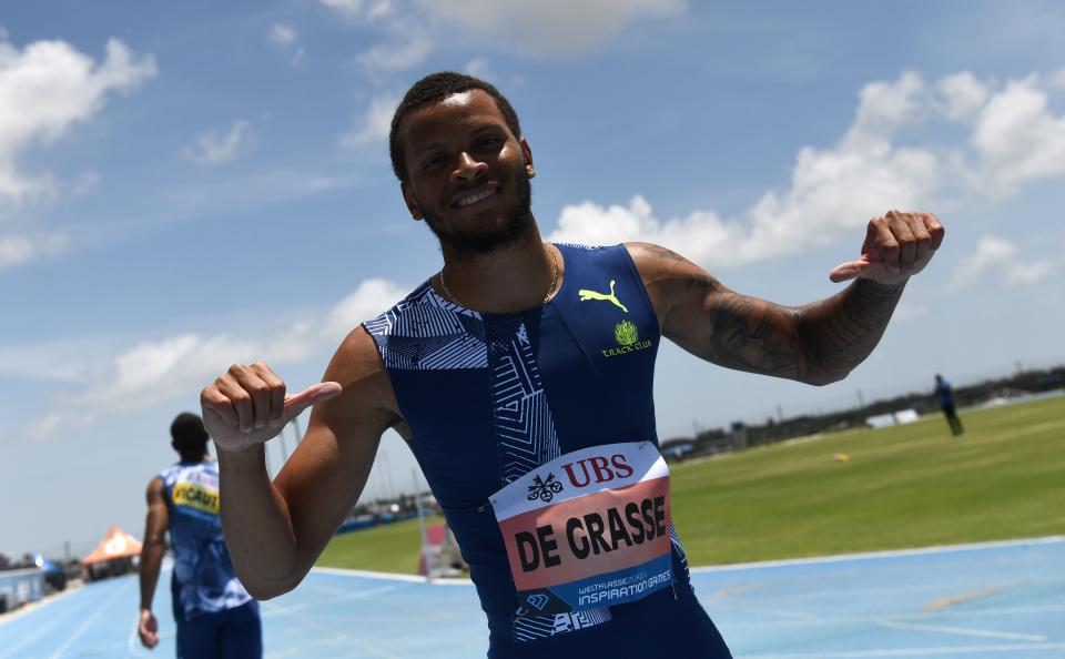 Canada's Andre De Grasse (pictured) celebrates after the men's 100 Yard.