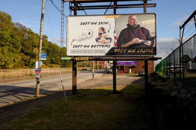 A billboard in Braddock, with a line at the bottom that says 