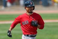 Mar 10, 2019; Port Charlotte, FL, USA; Boston Red Sox right fielder Mookie Betts (50) grounds out against the Tampa Bay Rays in the fourth inning at Charlotte Sports Park. Mandatory Credit: Aaron Doster-USA TODAY Sports