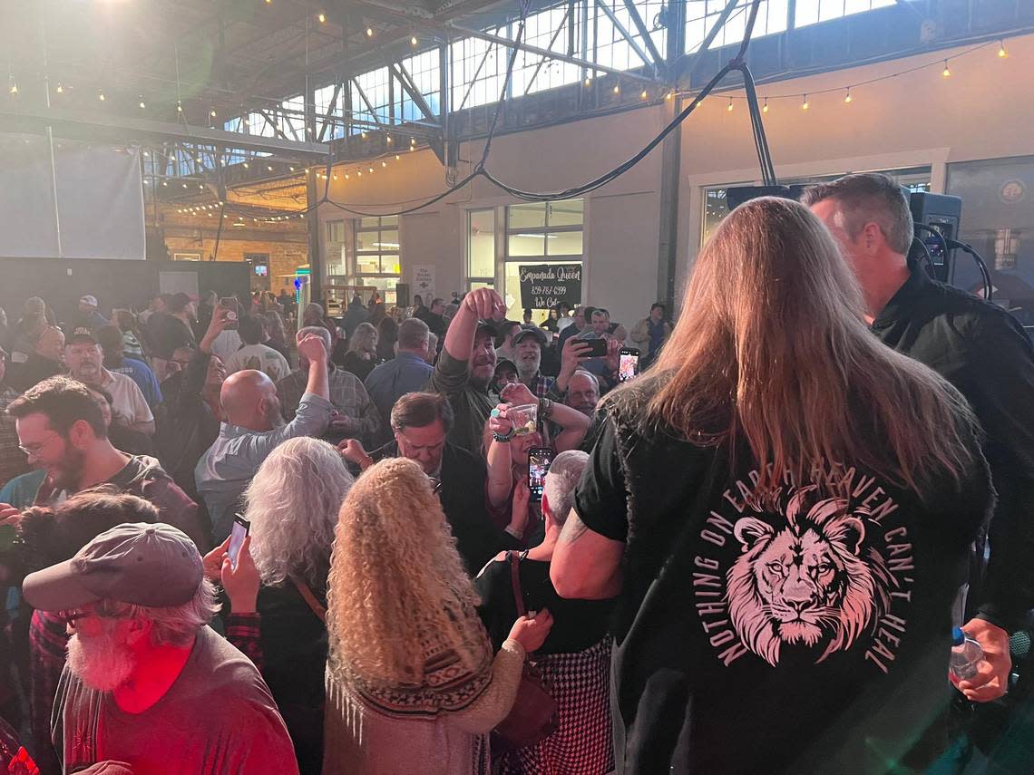 Lead vocalist of legendary classic rock band Lynyrd Skynyrd, Johnny Van Zant, stays behind and signs autographs with fans following an inmate concert at Greyline station, as part of the grand opening celebration for the new Bespoken Spirits Distillery in Lexington, Ky on March 27, 2024.