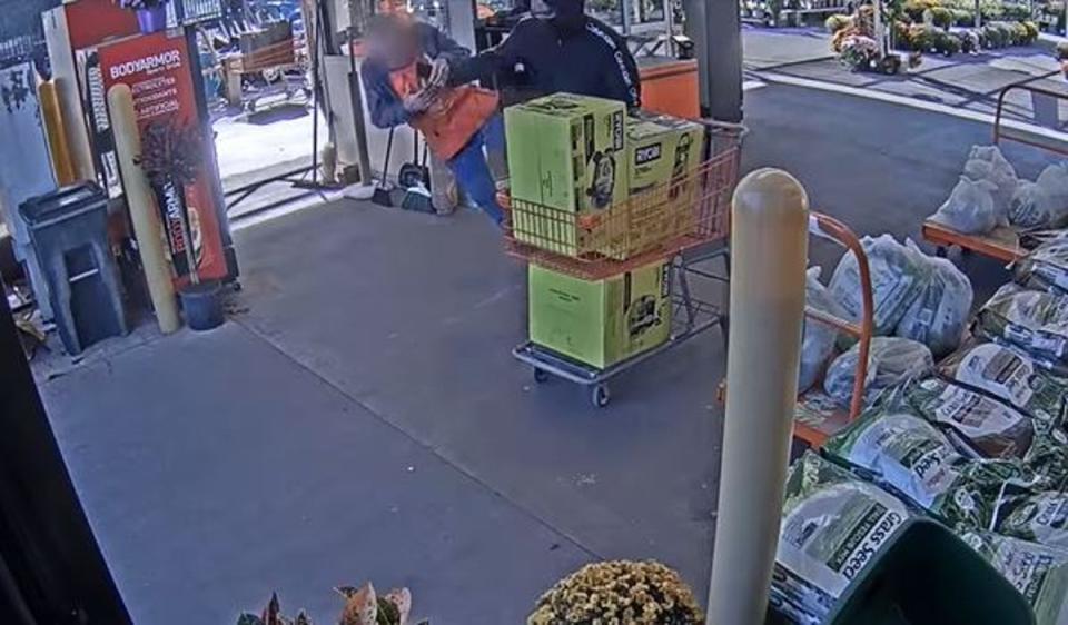 Surveillance footage captured a shoplifter shoving Home Depot worker Gary Rasor (Screengrab/ Hillsborough Police Department)