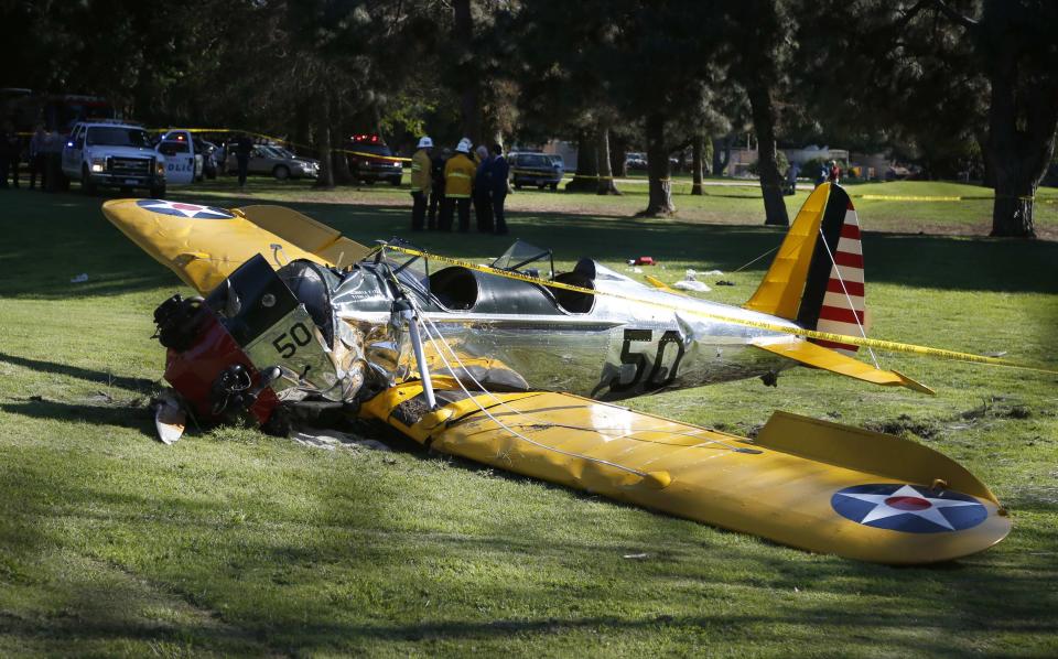 An airplane sits after crash landing at Penmar Golf Course in Venice California March 5, 2015. Celebrity web site TMZ reports the pilot was actor Harrison Ford, who was critically injured in the crash. REUTERS/Lucy Nicholson (UNITED STATES - Tags: DISASTER TRANSPORT ENTERTAINMENT)