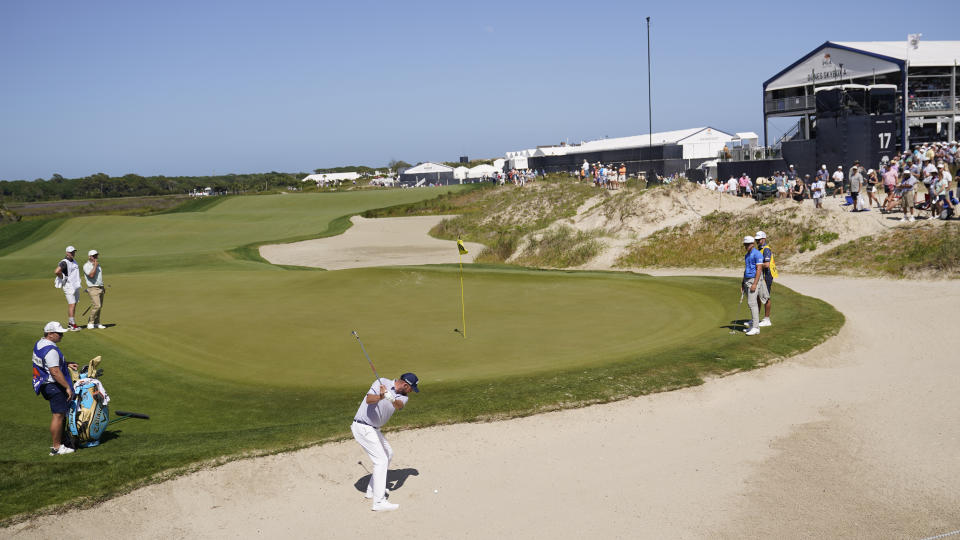 Marc Leishman, of Australia, hits out of the bunker on the tenth hole during the second round of the PGA Championship golf tournament on the Ocean Course Friday, May 21, 2021, in Kiawah Island, S.C. (AP Photo/David J. Phillip)