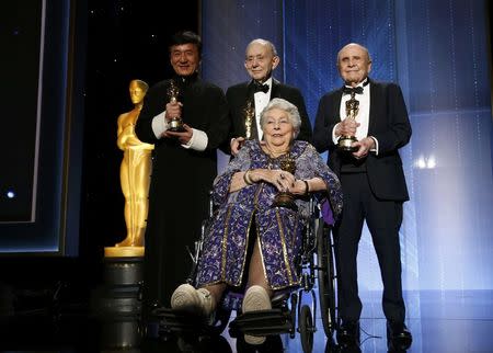 (L-R) Honorary Award winners Jackie Chan, Frederick Wiseman, Anne V. Coates and Lynn Stalmaster pose on stage at the 8th Annual Governors Awards in Los Angeles, California, U.S., November 12, 2016. REUTERS/Mario Anzuoni