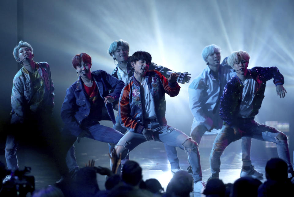 FILE - BTS performs "DNA" at the American Music Awards in Los Angeles on Nov. 19, 2017. “Dynamite,” the group’s first all-English song, debuted at No. 1 on the U.S. music charts this week, making BTS first Korean pop act to top the chart. (Photo by Matt Sayles/Invision/AP, File)