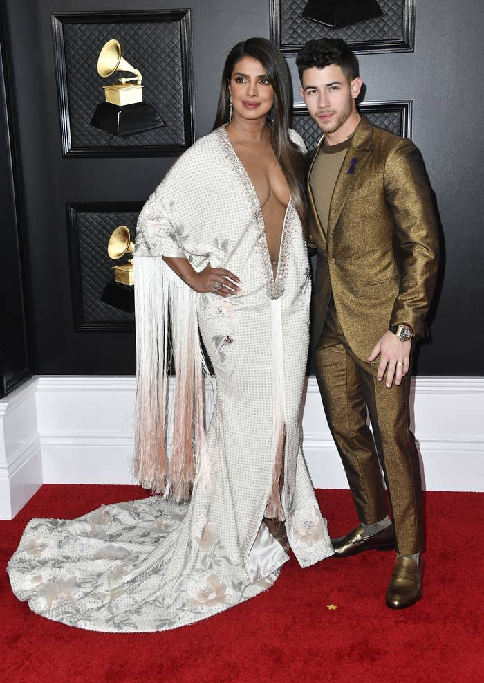 Priyanka and Joe posing on the Grammy's red carpet