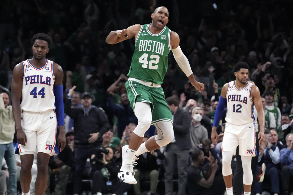 Boston Celtics center Al Horford (42) celebrates after hitting a 3-pointer against the Philadelphia 76ers during the first half of Game 2 in the NBA basketball Eastern Conference semifinals playoff series, Wednesday, May 3, 2023, in Boston. (AP Photo/Charles Krupa)