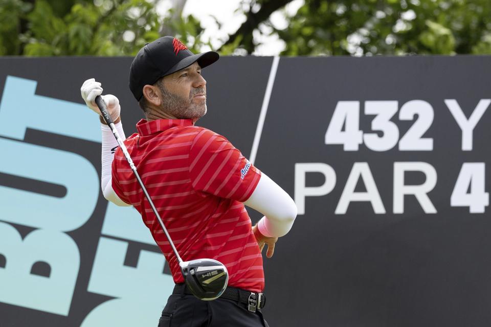 Captain Sergio Garcia, of Fireballs GC, watches his shot from the 14th tee during the final round of LIV Golf DC at Trump National, Sunday, May 28, 2023, in Sterling, Va. (Hunter Martin/LIV Golf via AP)