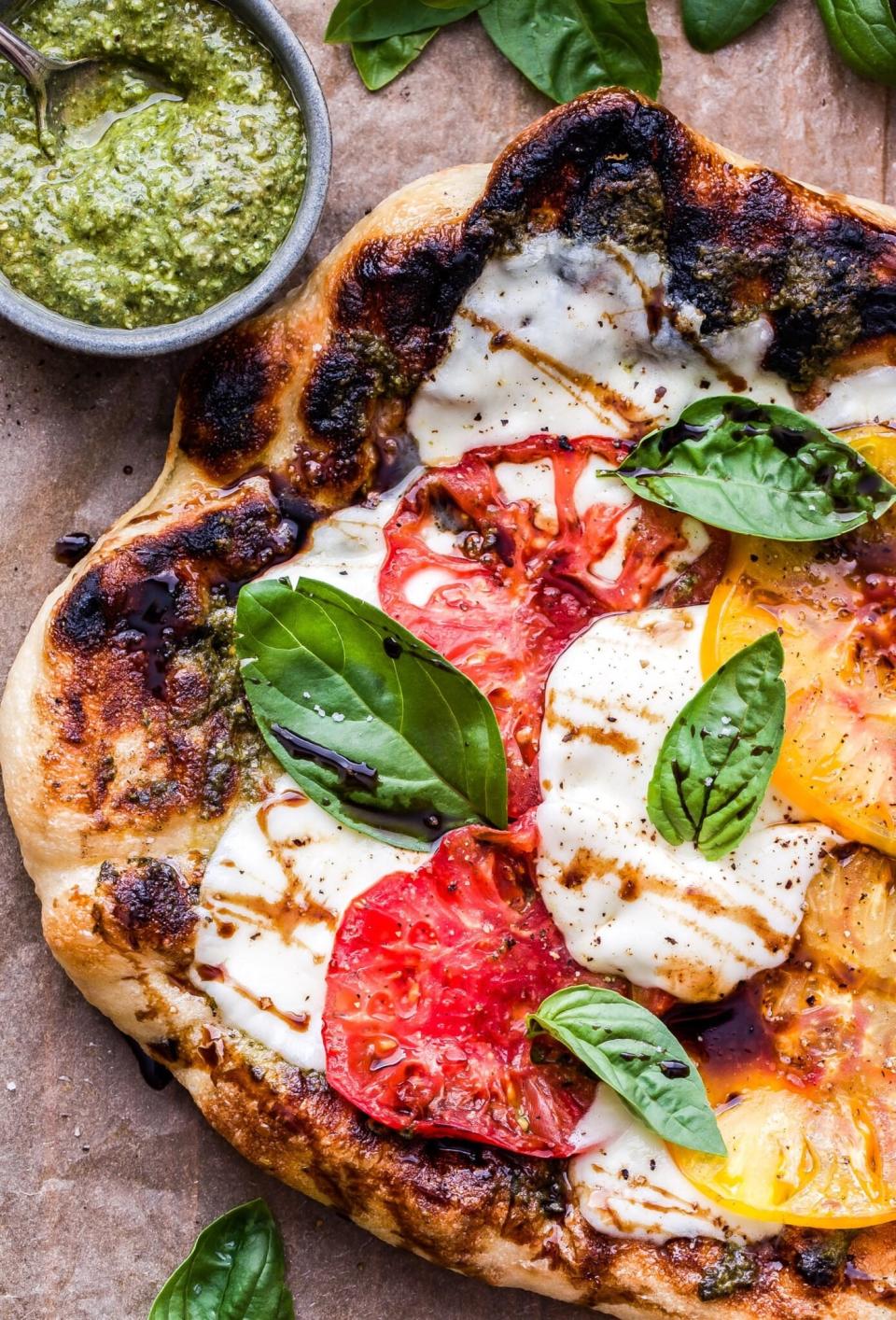 A grilled Caprese pizza.