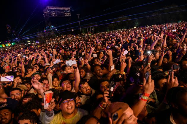 The crowd watches as Travis Scott performs at Astroworld Festival at NRG park on Friday, Nov.  5, 2021 in Houston. Several people died and numerous others were injured in what officials described as a surge of the crowd at the music festival while Scott was performing. Officials declared a “mass casualty incident” just after 9 p.m. Friday during the festival where an estimated 50,000 people were in attendance, Houston Fire Chief Samuel Peña told reporters at a news conference. (Jamaal Ellis/Houston Chronicle via AP) (Photo: via Associated Press)