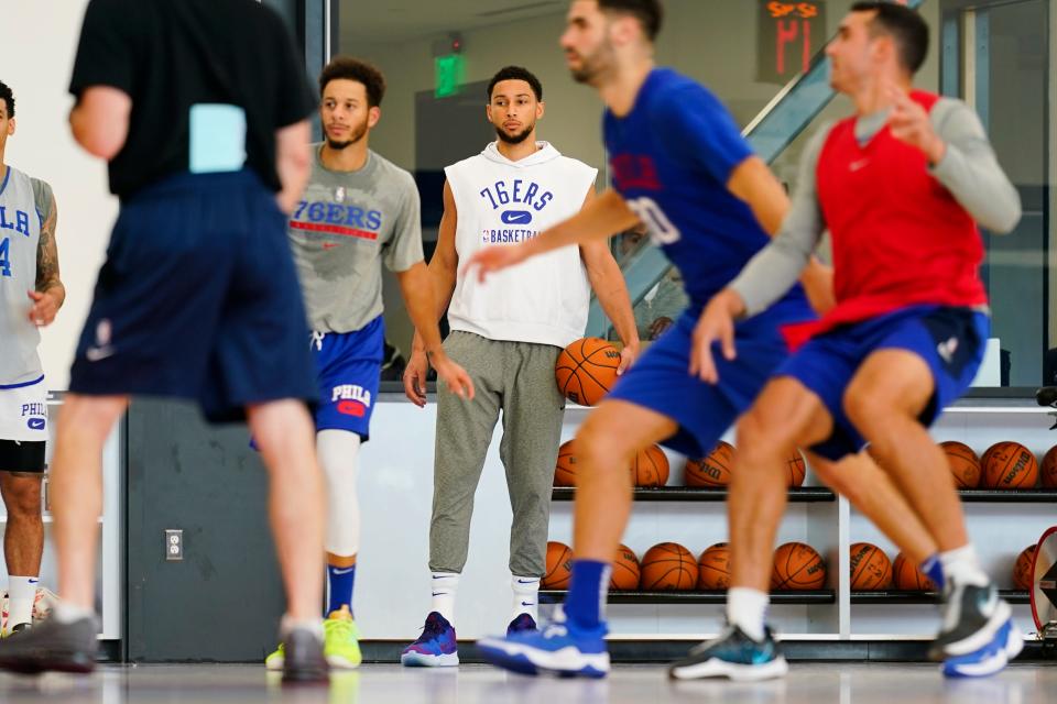 Ben Simmons (center right) has not been a particularly active participant since returning to practice.