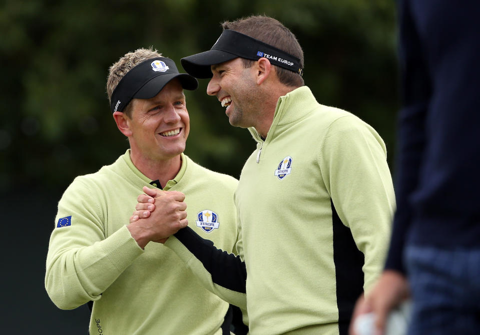 MEDINAH, IL - SEPTEMBER 28: Luke Donald and Sergio Garcia of Europe celebrate on the fifth green during the Morning Foursome Matches for The 39th Ryder Cup at Medinah Country Club on September 28, 2012 in Medinah, Illinois. (Photo by Ross Kinnaird/Getty Images)