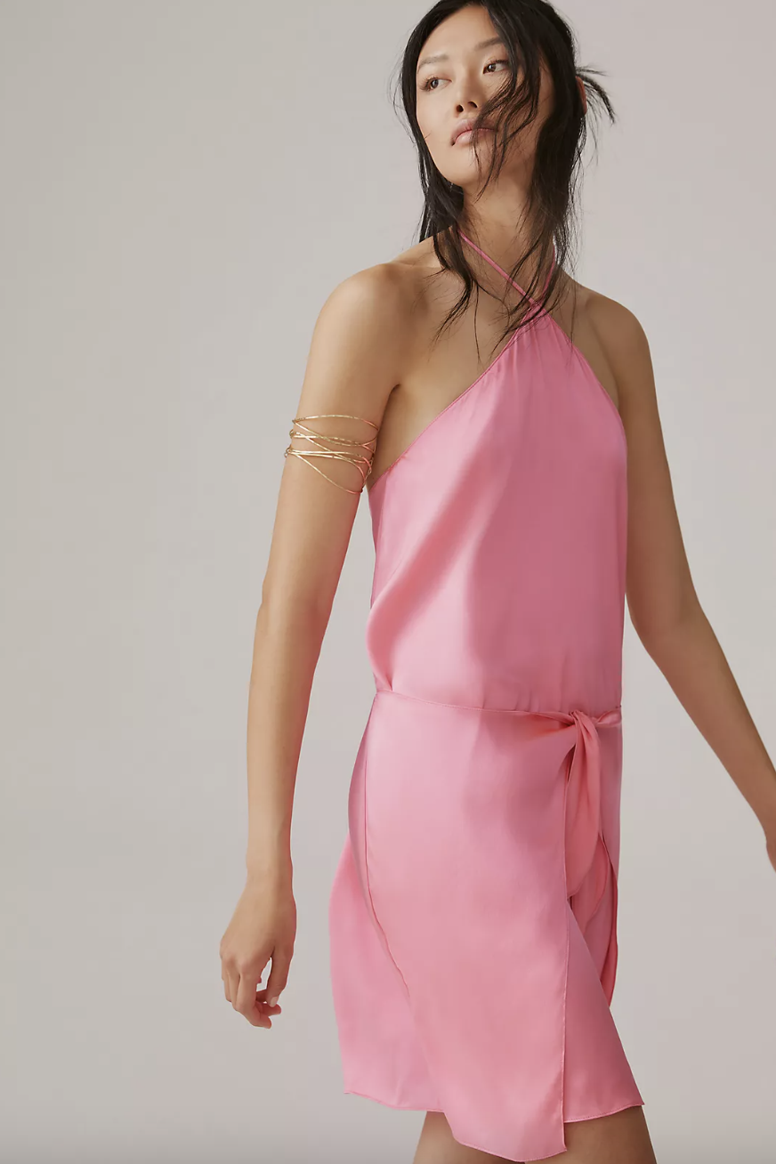 asian model in light pink dress, Amanda Uprichard Silk Halter Mini Dress (Photo via Anthropologie)
