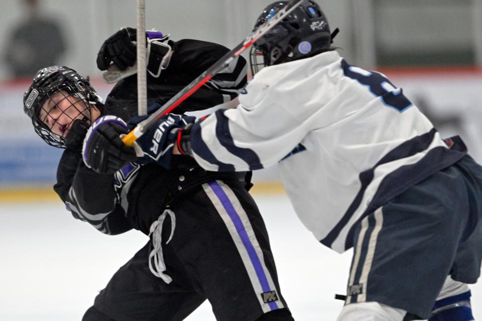 Shane Corcoran of Sandwich checks Nate Averill of Martha's Vineyard on Feb. 15, 2023.