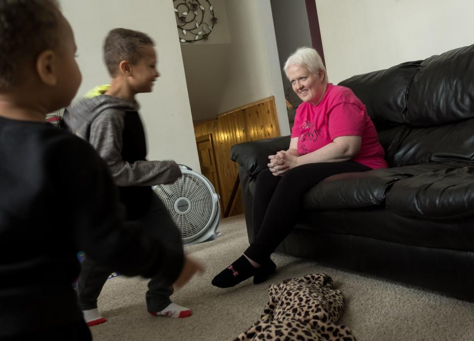 Kim Voelker-Wesley, 41, of Montrose watches her sons Donald Wesley (left), 6, and Cameron Wesley, 3, run around the living room while home on holiday break from school her home in Montrose on Thursday, January 3, 2019.
Voelker-Wesley is battling skin cancer that spread to her breast, lungs and liver after being in remission for five years. The disease has robbed her of her livelihood and independence, but not her hopes. She has one New Year's Resolution: to live.