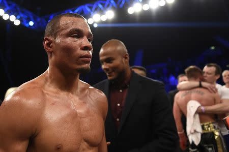 Boxing - Nick Blackwell v Chris Eubank Jnr British Middleweight Title - The SSE Arena, Wembley - 26/3/16 Chris Eubank Jnr celebrates after the fight as Nick Blackwell looks dejected Action Images / Adam Holt EDITORIAL USE ONLY.