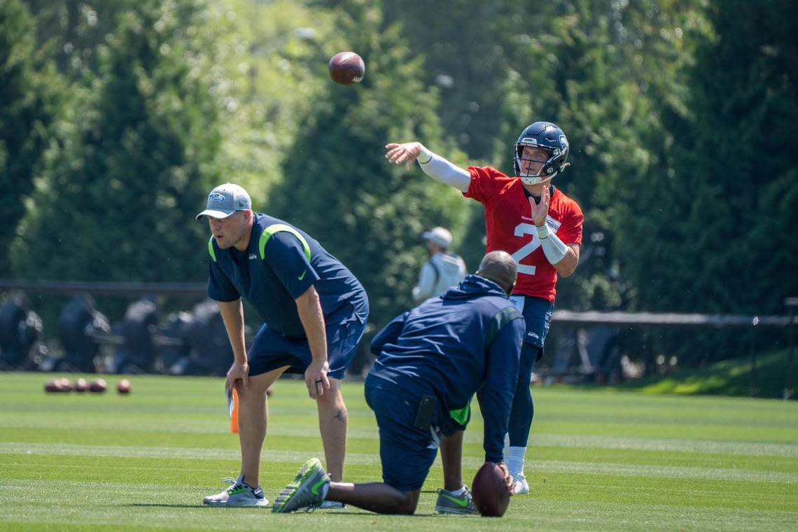 Seattle Seahawks quarterback Drew Lock works on his throwing passing to his teammates during the second day of Seahawks training camp at the Virginia Mason Athletic Center on July 28, 2022.