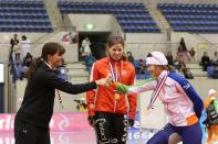 NAGANO, JAPAN - DECEMBER 09: (L-R) Heather Richardson of USA for second place, Christine Nesbitt of Canada for first place, Lotte van Beek of Netherlands for third place celebrate on the podium after the Women's 1000m during day two of the ISU World Cup Speed Skating at MWave on December 9, 2012 in Nagano, Japan. (Photo by Ken Ishii/Getty Images)