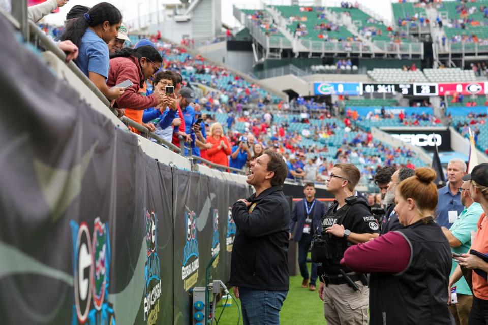 <div class="inline-image__caption"><p>Florida’s Republican Gov. Ron DeSantis at the Florida-Georgia college football game on Saturday, Oct. 29, 2022, in Jacksonville, Fla. </p></div> <div class="inline-image__credit">Logan Bowles via AP</div>