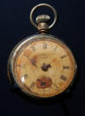 A pocket watch displaying the time ten minutes to two, which was recovered from the body of Titanic steward Sidney Sedunary, is displayed at the museum's Titanic exhibition on April 3, 2012 in Southampton, England. The new SeaCity Museum, which will open at 1.30pm on April 10, 100 years to the day since the Titanic set sail from the city. The museum, which cost 15 GBP million, promises to tell the largely untold story of Southampton's Titanic crew and the impact the tragedy had on the city, as well as featuring other aspects of the city's seafaring past. (Photo by Matt Cardy/Getty Images)