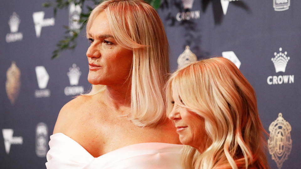 Dani Laidley and her partner Donna Leckie are pictured on the Brownlow Medal red carpet.