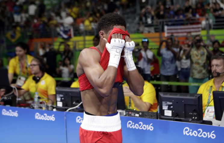 Shakur Stevenson (R) reacts after losing in the gold medal match Saturday. (AP)