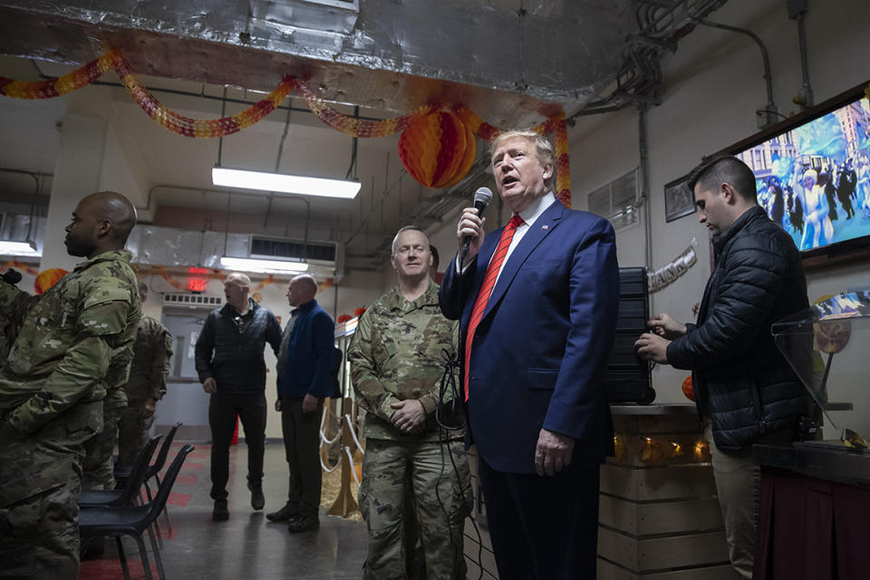 President Donald Trump speaks at a dinning facility during a surprise Thanksgiving Day visit to the troops, Thursday, Nov. 28, 2019, at Bagram Air Field, Afghanistan. (AP Photo/Alex Brandon)