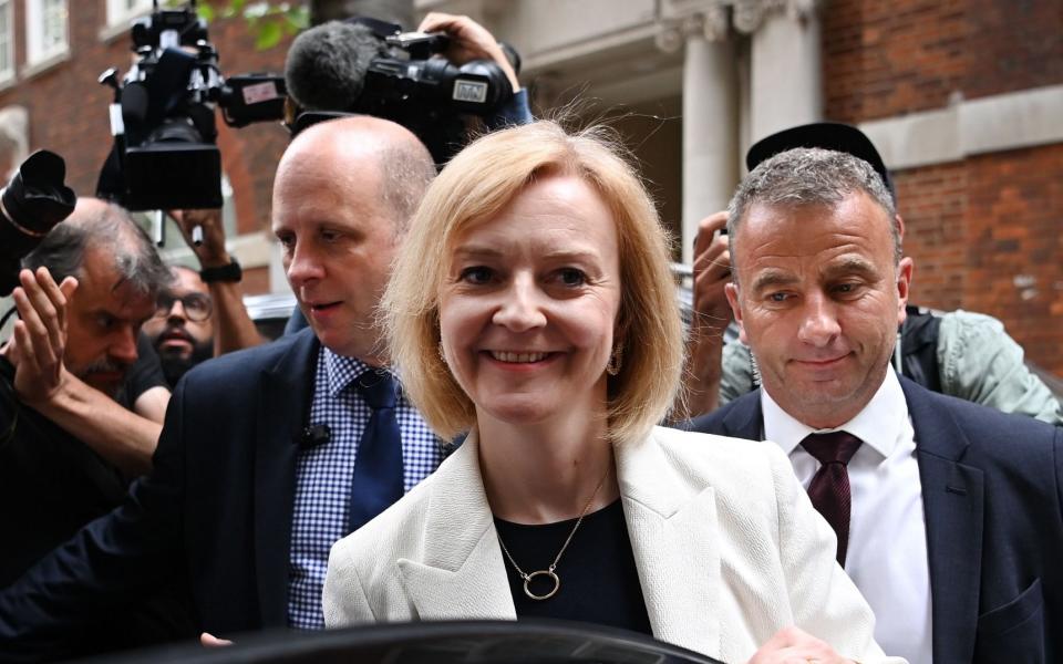 Liz Truss leaving a husting events in London on Thursday. The leadership contender has promised a tax break for parents and carers forced to stay at home - Andy Rain/EPA-EFE/Shutterstock