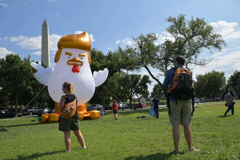 The chicken was set up in the morning. Within hours, passersby flocked to check it out.&nbsp;Photographer: MANDEL NGAN/AFP/Getty Images